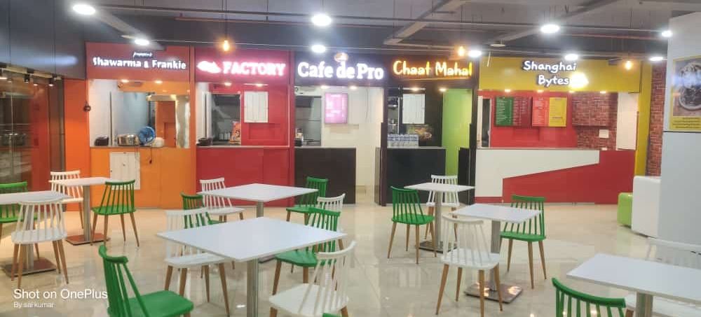 Completed dining hall — branded counters and seating